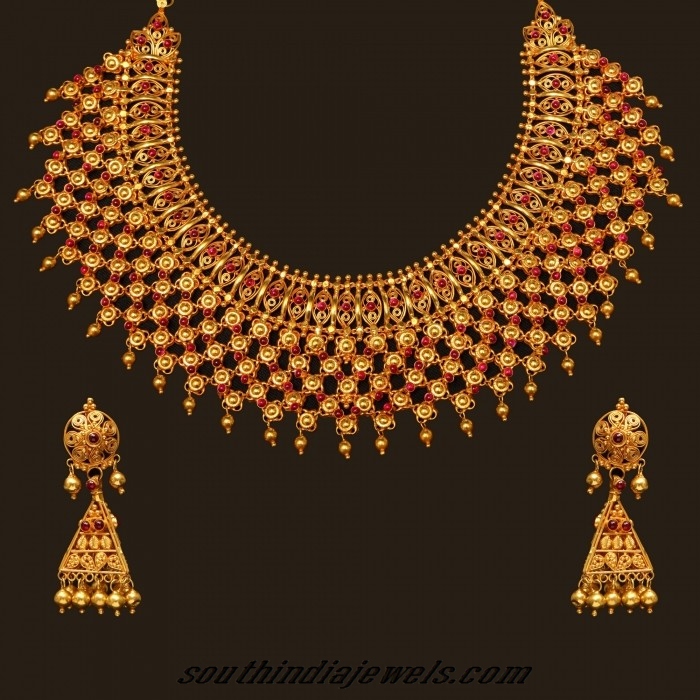 Gold choker necklace set with earrings