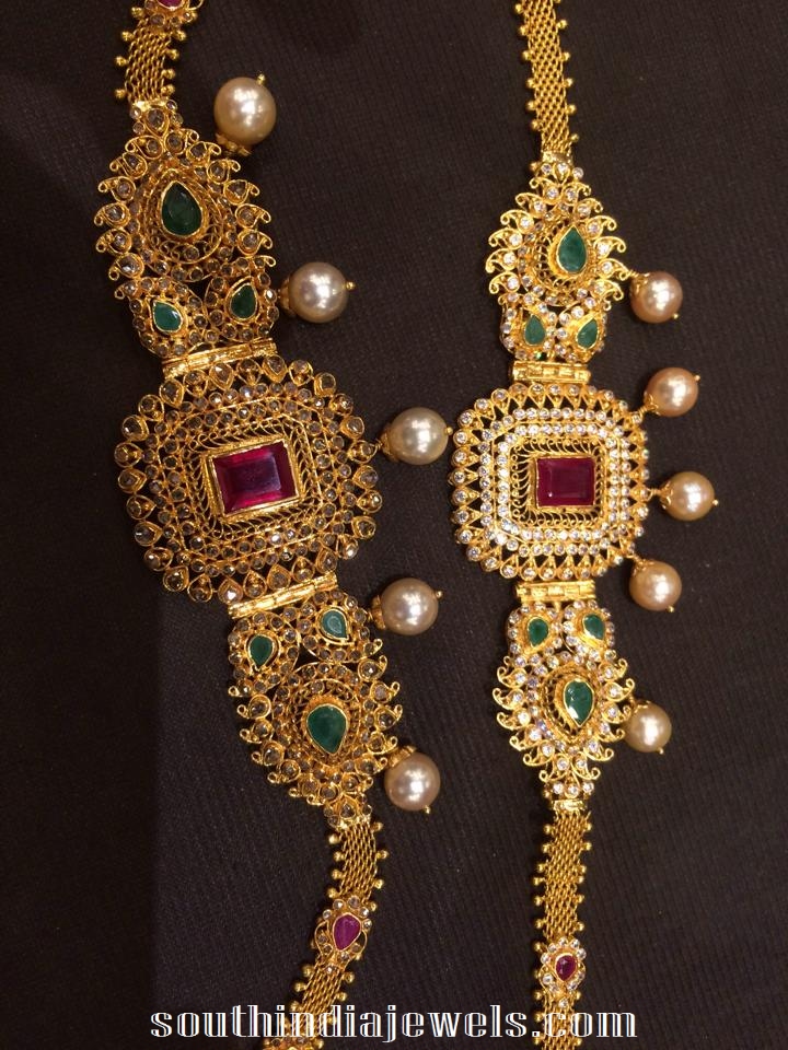 gold arm band with rubies, emeralds and southsea pearls