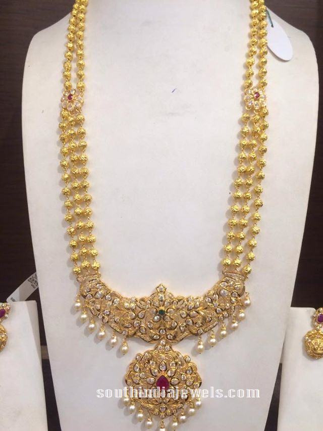22k gold multilayer long haram with stone pendant