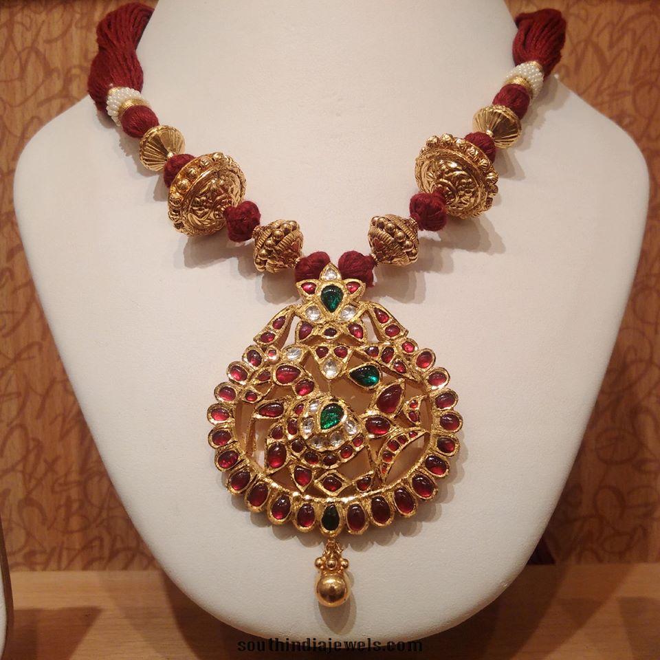 Gold threaded kemp necklace design