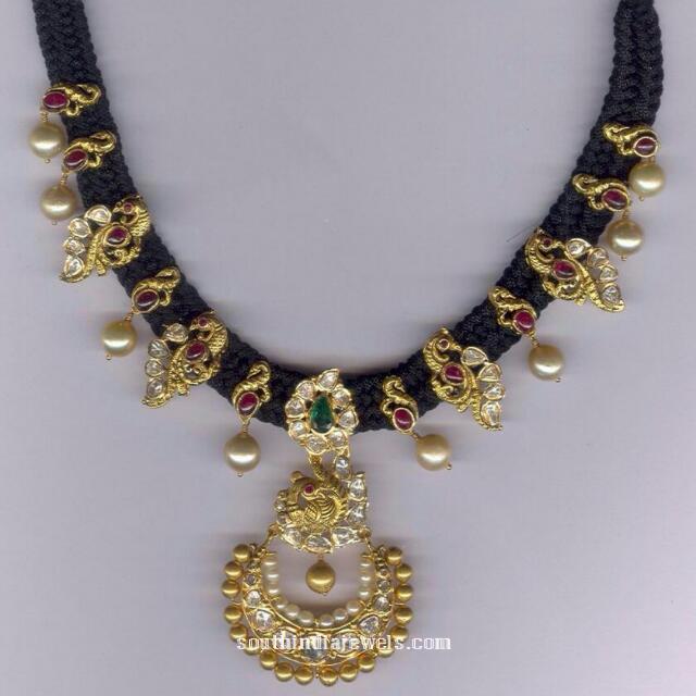 Black thread necklace with pearls