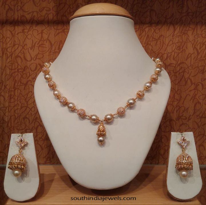 Light weight gold pearl mala with jhumka 