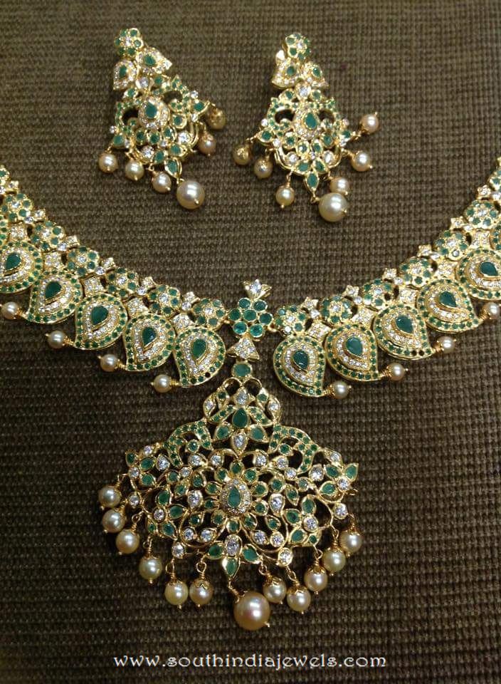 Gold Emerald Mango Mala from Dhanlaxmi Jewellers