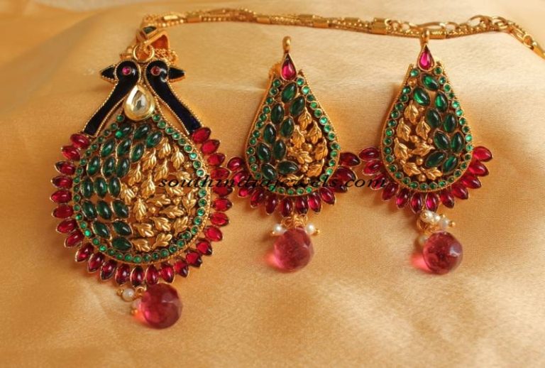 22K Gold Pendant studded with rubies and emeralds