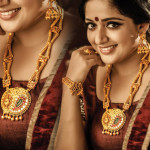 Actress Kavya Madhavan in Traditional Gold Jewelleries