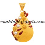 Latest Gold Jewellery Designs : Pearl and ruby pendant