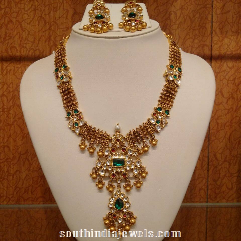 Gold antoque emerald polki necklace design