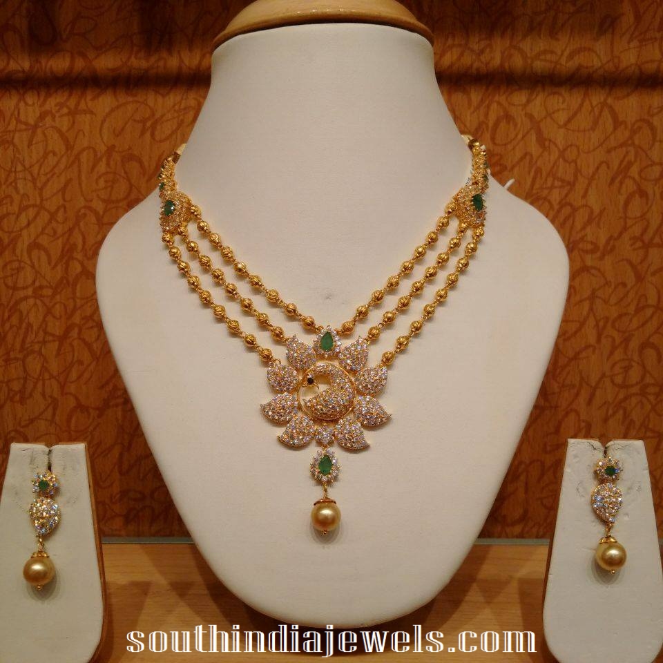 Three Layer Gold Ball Necklace With Peacock Pendant