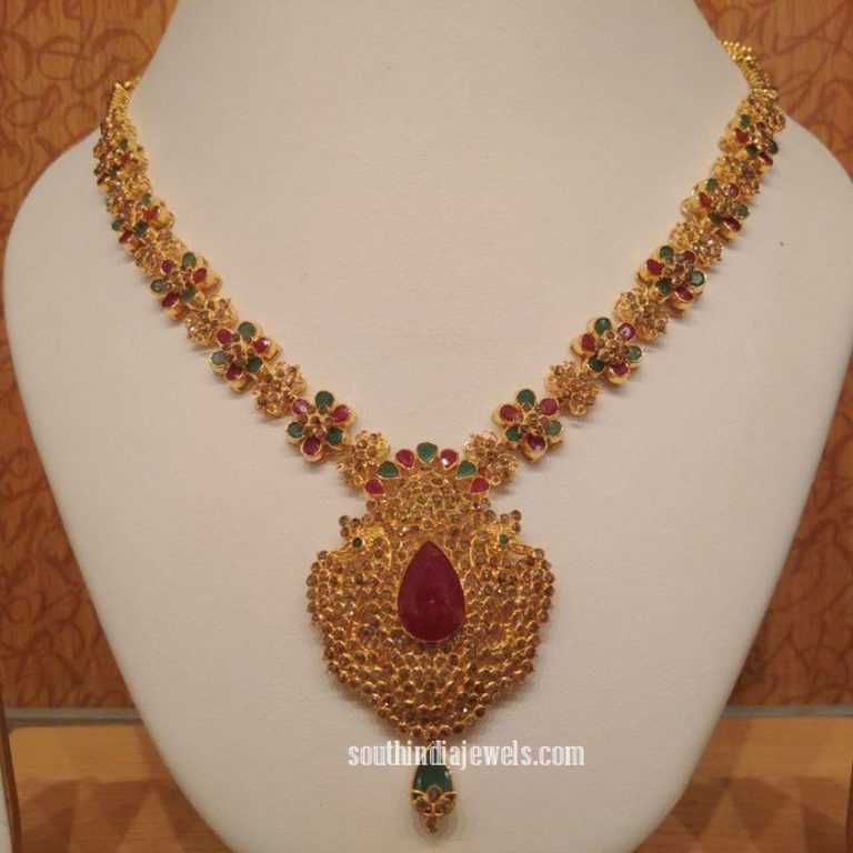 Gold floral ruby emerald necklace from NAJ