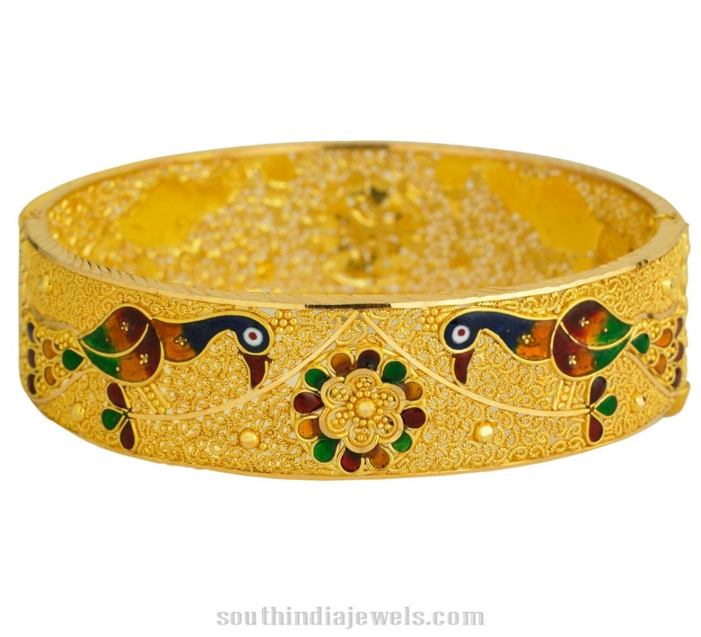 Gold peacock bangle from Kerala Jewellers