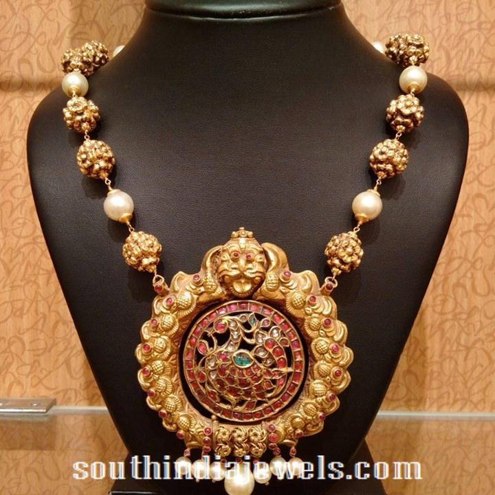 Gold mala with nakshi peacock pendant from NAJ