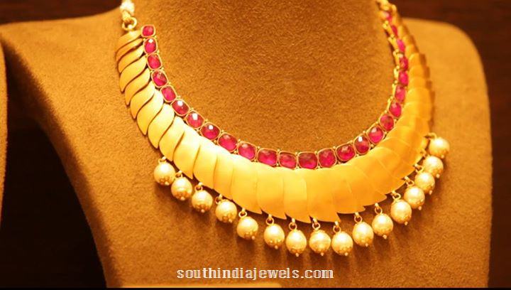 Designer gold ruby necklace from Manubhai Jewellers