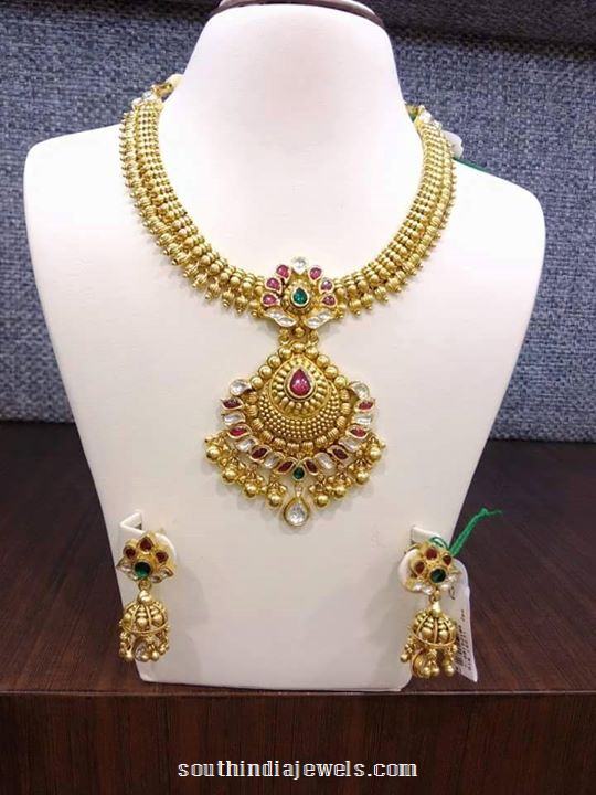 Gold matt finish attigai necklace with jhumka