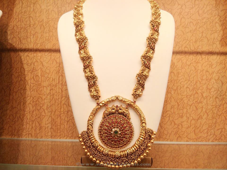 Gold Antique Long Haar with Peacock Pendant 