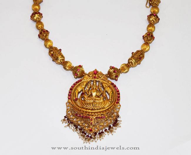 Gold Antique Necklace Set from Karpagam Jewellers