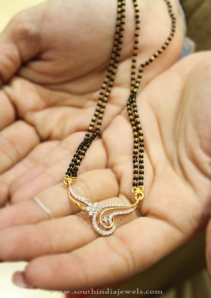Gold Black Bead Mangalsutra from Manubhai Jewellers