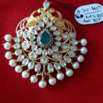 Gold Peacock Pendant with White Stones