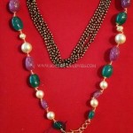 Black Bead Mala with Rubies and Emeralds