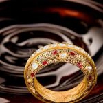 Gold Designer Bangle With Red Stones