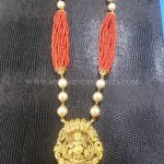 Gold Coral Necklace With Temple Pendant
