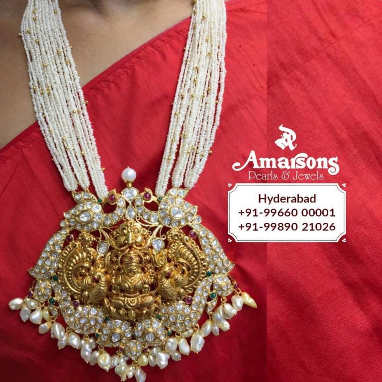 gold-lakshmi-locket-with-uncut-diamond-pearls